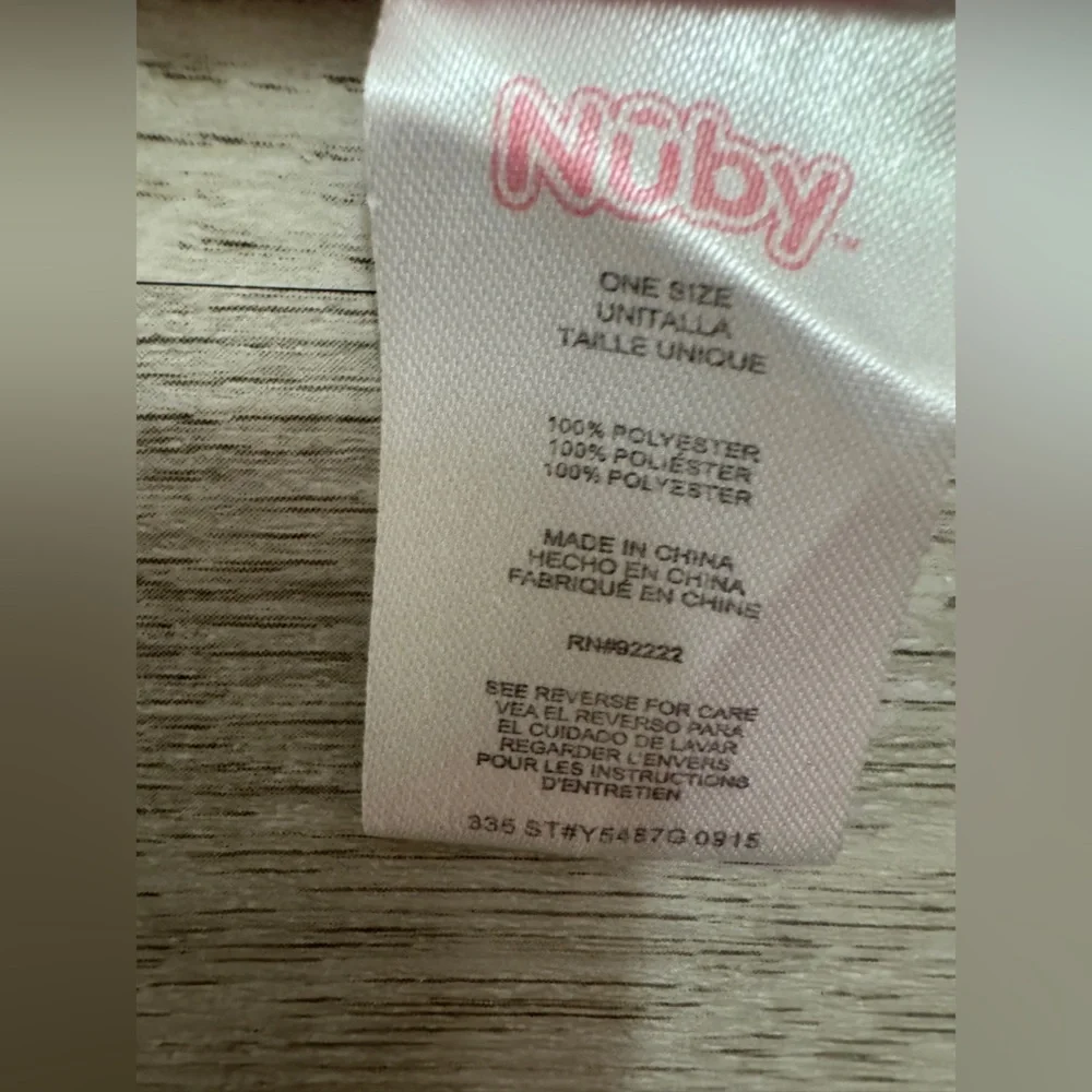 Pink and White Blanket by Ning